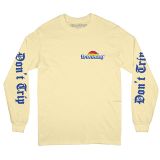 Baja Sun Long Sleeve Tee in light yellow with white navy and orange Free & Easy sun bird design on the left chest and sleeves on a white background, front - Free & Easy