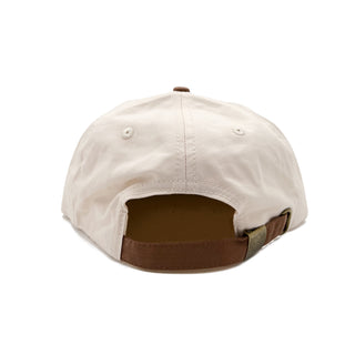 Free & Easy bone and brown lightweight hat with orange, yellow and brown embroidered sun with bird logo on white background - Free & Easy