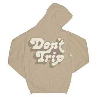 Don't Trip OG Hoodie in sand with white and beige Don't Trip logo design on back on a white background - Free & Easy