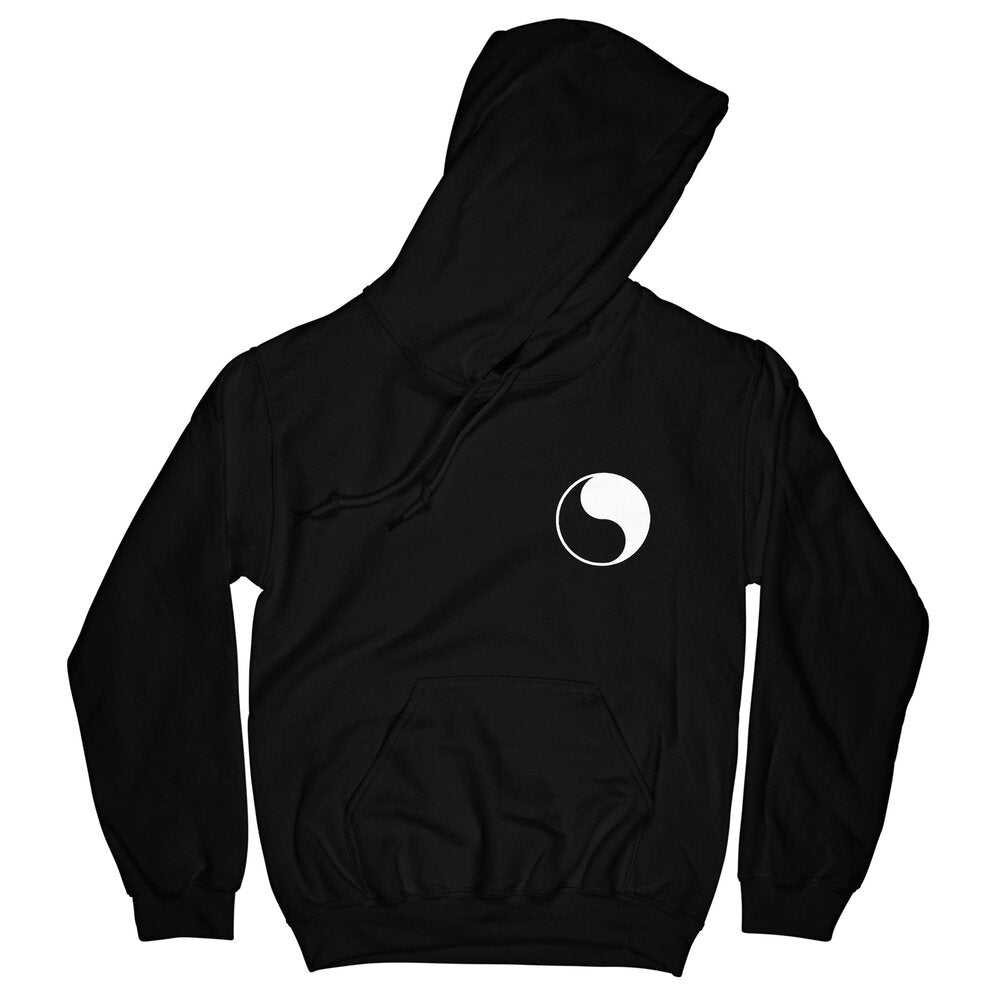 Don't Trip OG Hoodie in black with white yin yang design on front left side on a white background - Free & Easy