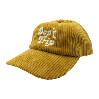 Don't Trip Fat Corduroy Dad Hat in mustard with white Don't Trip logo on a white background - Free & Easy